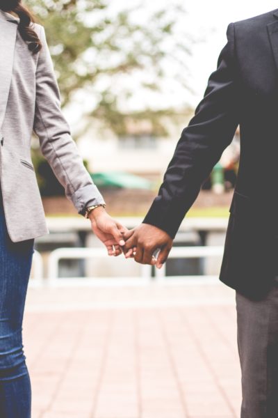 Baby Be Mine by Reese Ryan. Photo of couple holding hands courtesy of William Stitt